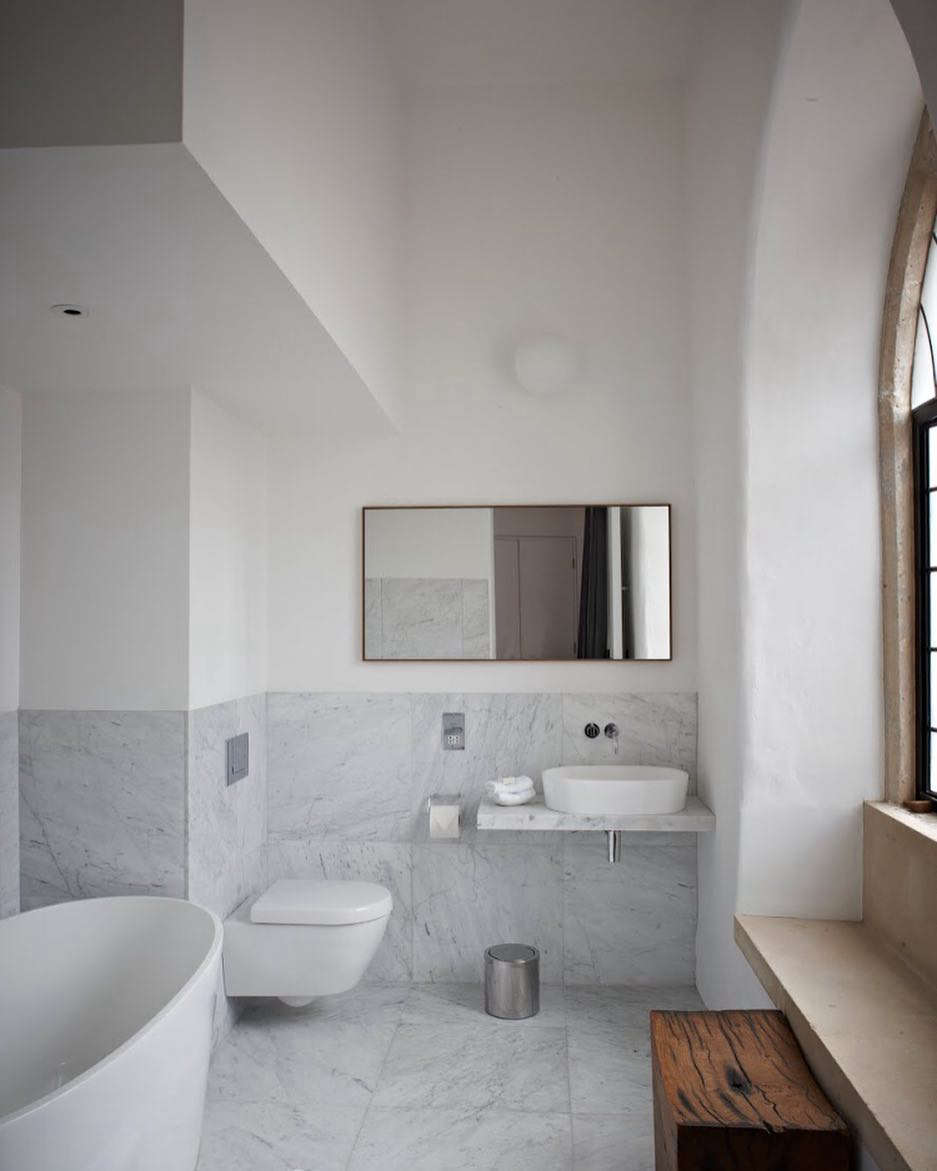 Spartan, marble-tiled baths. Photograph courtesy of At the Chapel.