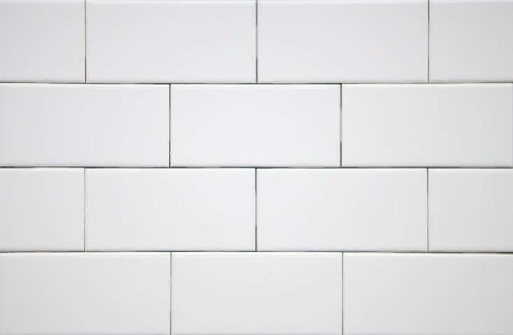 Steal This Look Minimalist English Kitchen Remodelista Above The Inset Backsplash Behind Range Is Made Of 3 By 6 Inch Ceramic Tile From Subway Ceramics Set With Dark Grout