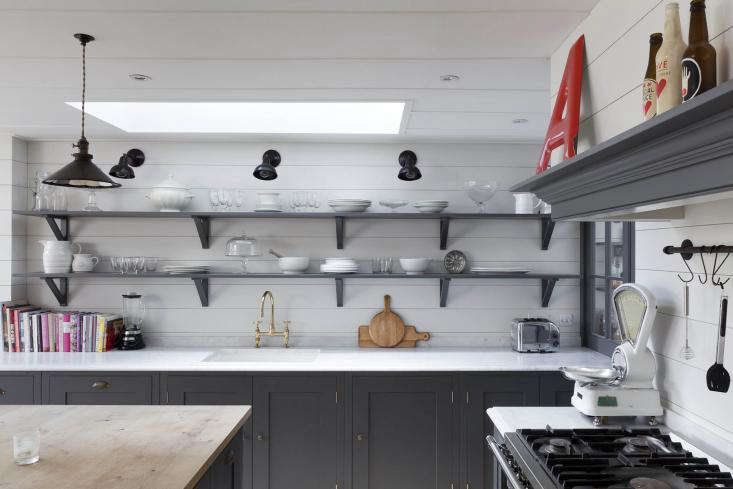 Shiplap is quite happily paired with elegant marble counters in photographer Abi Campbell’s London kitchen. Photograph by Matt Clayton.