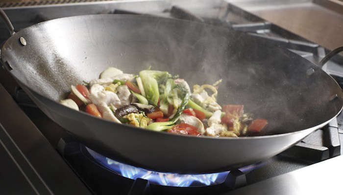 Bluestar Ranges and Cooktops feature wok-ready burners with up to 25,000 BTU searing power. By removing the top ring grate on the burner, the wok sits directly in the flame for maximum heat.