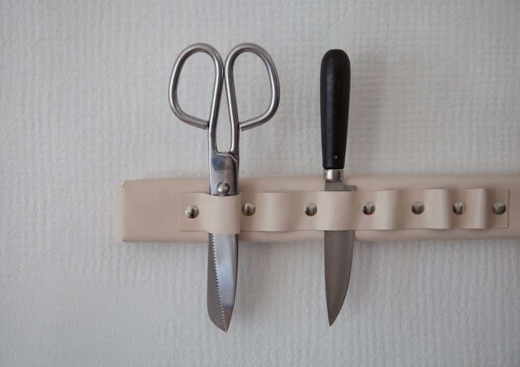 The knife rack hangs next to my stove for easy access to kitchen shears and paring knives. An alternative option is to nix the wooden block altogether and create an all-leather knife holster that hangs directly on the wall–something that I hope to try in my next apartment.