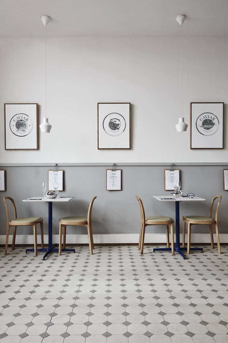 Hard-wearing stoneware tile in A Caviar Bar in Finland with a Wintry Palette.