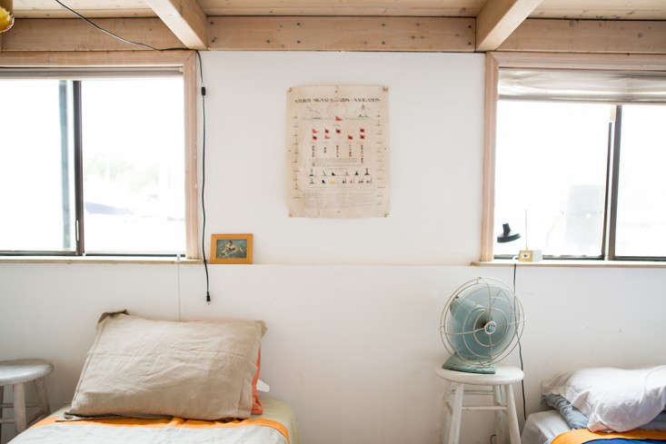 A nautical poster tacked to the wall.