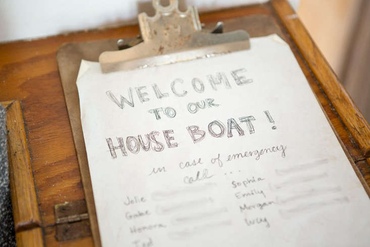 All eight owners of the boat pitched in to paint, reupholster cushions, and decorate the walls—and the work continues. During last winter