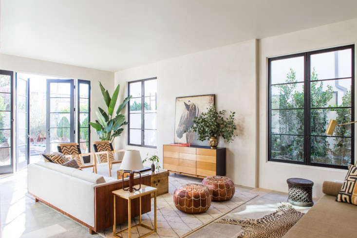 Herzig says, “I spent a lot on light fixtures but was more resourceful when it came to the windows and doors. I desperately wanted those gorgeous, big steel-framed doors, but they were totally cost prohibitive. Instead, I worked with Kobi’s Windows & Doors, a custom manufacturer, to create the same look with wood and glass.”