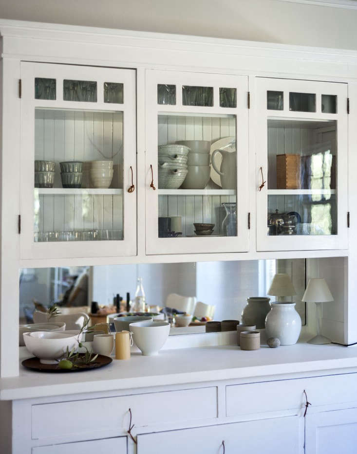 A Remodelista favorite, and one that is proof that the smallest changes can make the biggest difference: swapping less-than-desirable cabinet pulls. We like DIY leather pulls, like these simple knotted versions in Sarah’s Refined Rental; for a more polished version, see DIY Video: How to Make a $20 Cabinet Pull for $2.