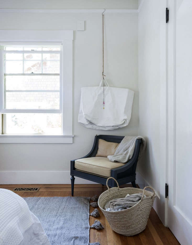 If you’re lucky enough to have molding in your apartment, use it to hang artwork (or extra storage), as Sarah did here with an S-hook and a length of string. Photograph from Sarah’s Refined Rental in St. Helena, CA.