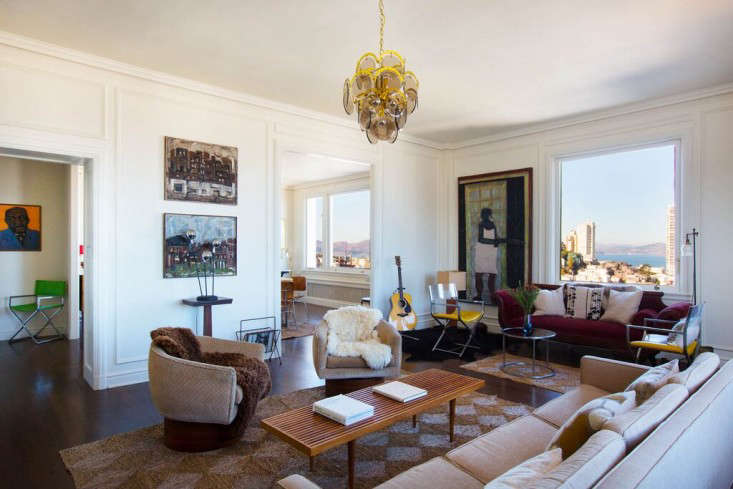 A San Francisco apartment filled with vintage treasures: The Milo Baughman swivel chairs were eBay scores, while the acid-green Milo Baughman side chair (at left) was discovered at a consignment shop. Photograph by Mimi Giboin, from Home Is Where the Art Is, SF Edition.