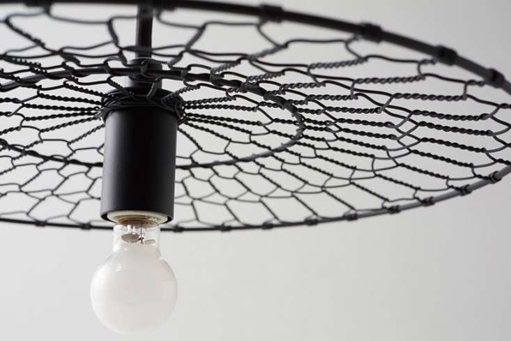 A Modern Take On Tradition The Basket Lamp From Nendo Remodelista Inspired By The Handwoven Wire Netting Of Japanese Cooking Utensils Made Kyoto Artisans For Centuries Pendant Lights Cast Spider Web Like Shadows