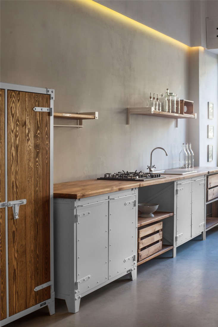 In a kitchen by a Cologne-based company, a countertop range keeps the appliance impact to a minimum and frees up storage space underneath. For more, see Kitchen of the Week: The New Old-World Kitchen from Noodles, Noodles & Noodles Corp.