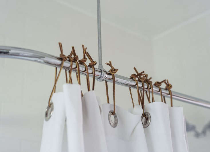 Another place where leather ties come in handy: as shower curtain holders, instead of standard-issue plastic rings. Sarah made the swap in her own bathroom; see Expert Advice: 10 Tips for Transforming a Rental Bath.