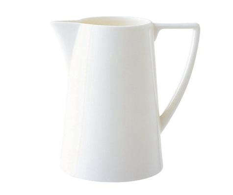 10 Easy Pieces Clic White Ceramic Pitchers Remodelista Above Sarah Swears By Uk Designer Jasper Conran S Clean Lined China White Pitcher Part Of His Collection For Wedgwood 66 99 At