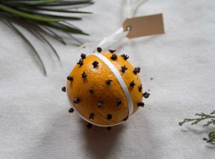 Who knew this old-school holiday favorite traces its roots to France? Pomanders (from pomme d’ambre, meaning “amber apple”) were originally worn or carried as an early form of perfume in the Middle Ages. Make this simple version with cloves to hang in the house or give as a gift; for instructions, see Gift Guide: 3 Last-Minute DIY Holiday Gifts.