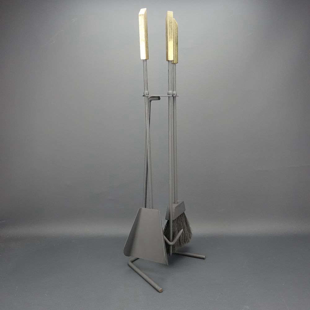Fireplace tools attributed to Conover are plentiful on eBay. This Brass and Iron Set sold for $9.99. Another Conover-designed set is currently on offer for $750 on Katz Modern.