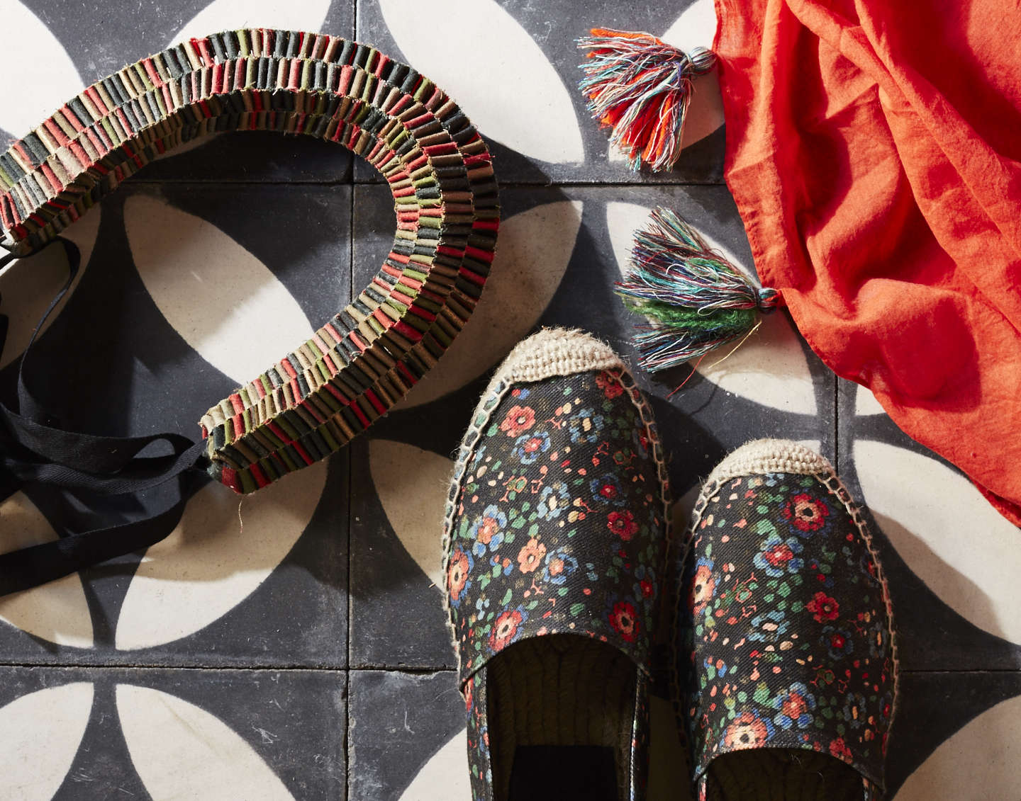 Stylist’s swag: The kitchen’s Mosaic House Moroccan cement tiles and this daisy pattern in the bath were both leftovers that Livia brought home from a Martha Stewart Living shoot; Danny installed a hydronic radiant heat system underneath them.