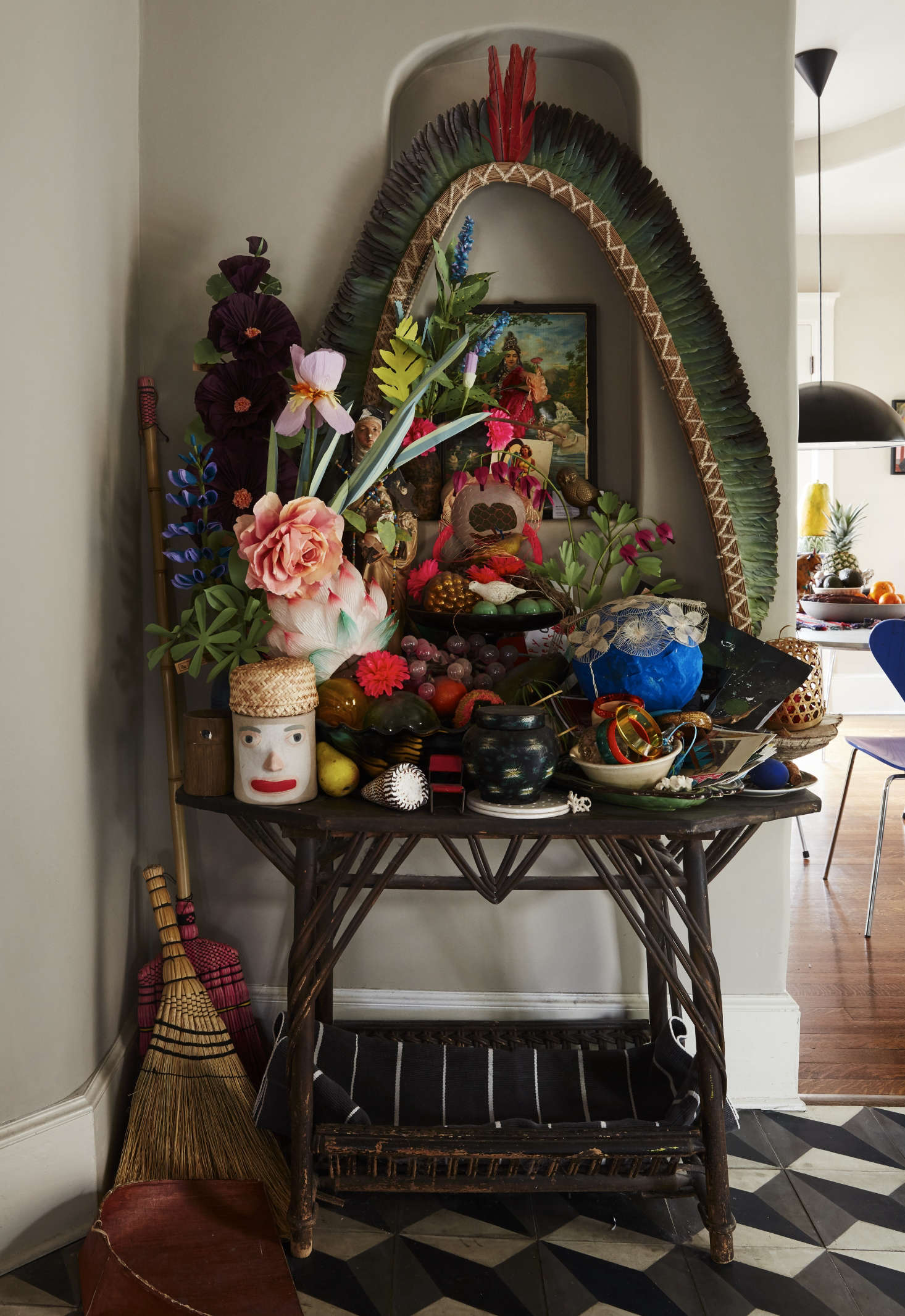 An ever-growing shrine rises in a recess that Danny built between the kitchen and living room. It’s crowned by a vintage Amazonian headdress found at a Connecticut tag sale, and that’s Lakshmi, the Hindu goddess of wealth—”not just money,” specifies Livia, “wealth of friendships, family, and quality of life”—in the middle.