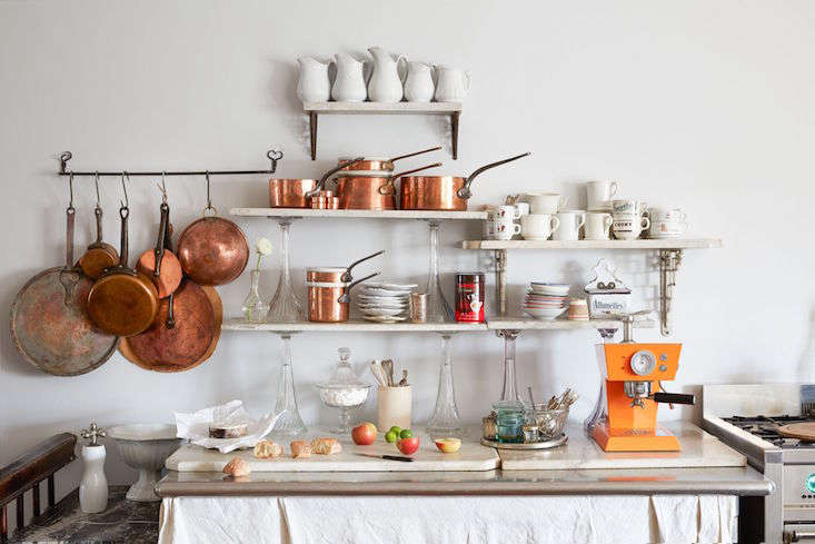 A practical use for multiple small scraps: open kitchen shelving (supported by sturdy brackets), as seen in A Historical Hudson, NY, Home Reimagined (European Antiques Included).