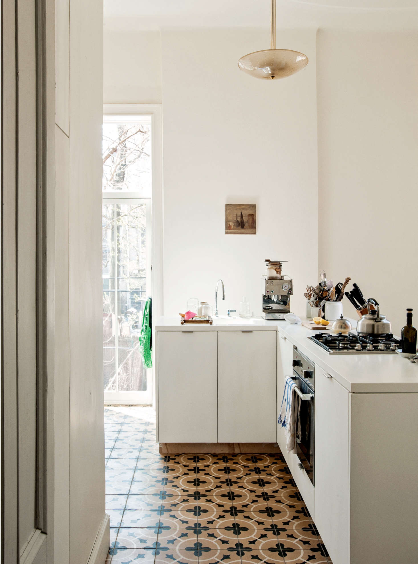 Here, a Murano glass fixture in the home of A Détacher designer Mona Kowalska. Photograph by Matthew Williams, courtesy of Rizzoli (the apartment is featured in Required Reading: Brooklyn Interiors from Rizzoli).