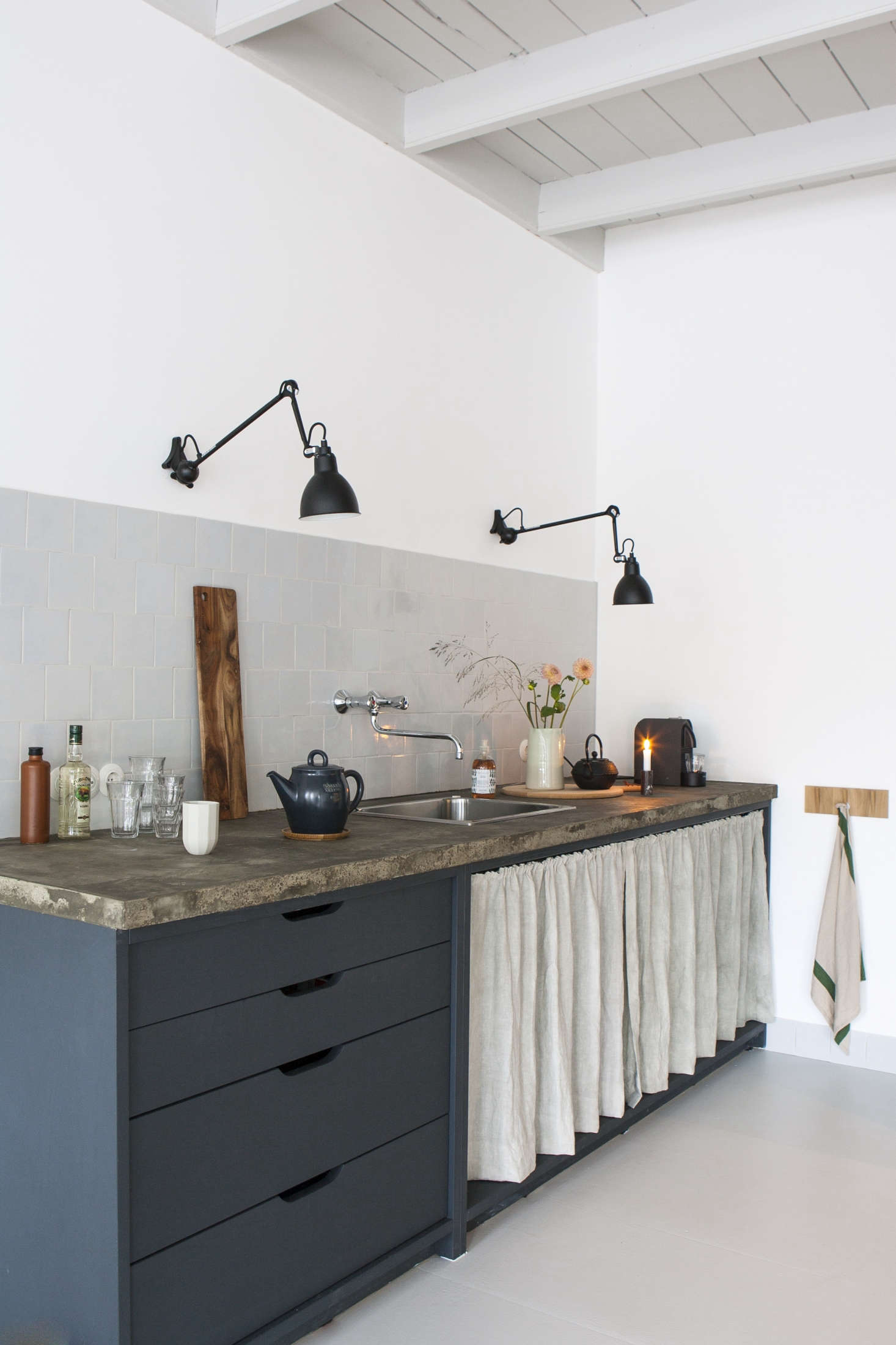 Drawers are given an easy-open cutout treatment in The Curtained Kitchen, Dutch Modern Edition.