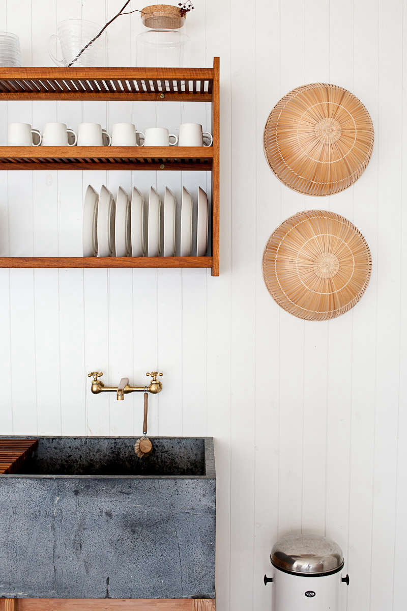 A soapstone sink weathering naturally. Photograph courtesy of Juli Baker, from O Canada: Mjölk’s Renovated Scandi-Style Cabin on a Lake.