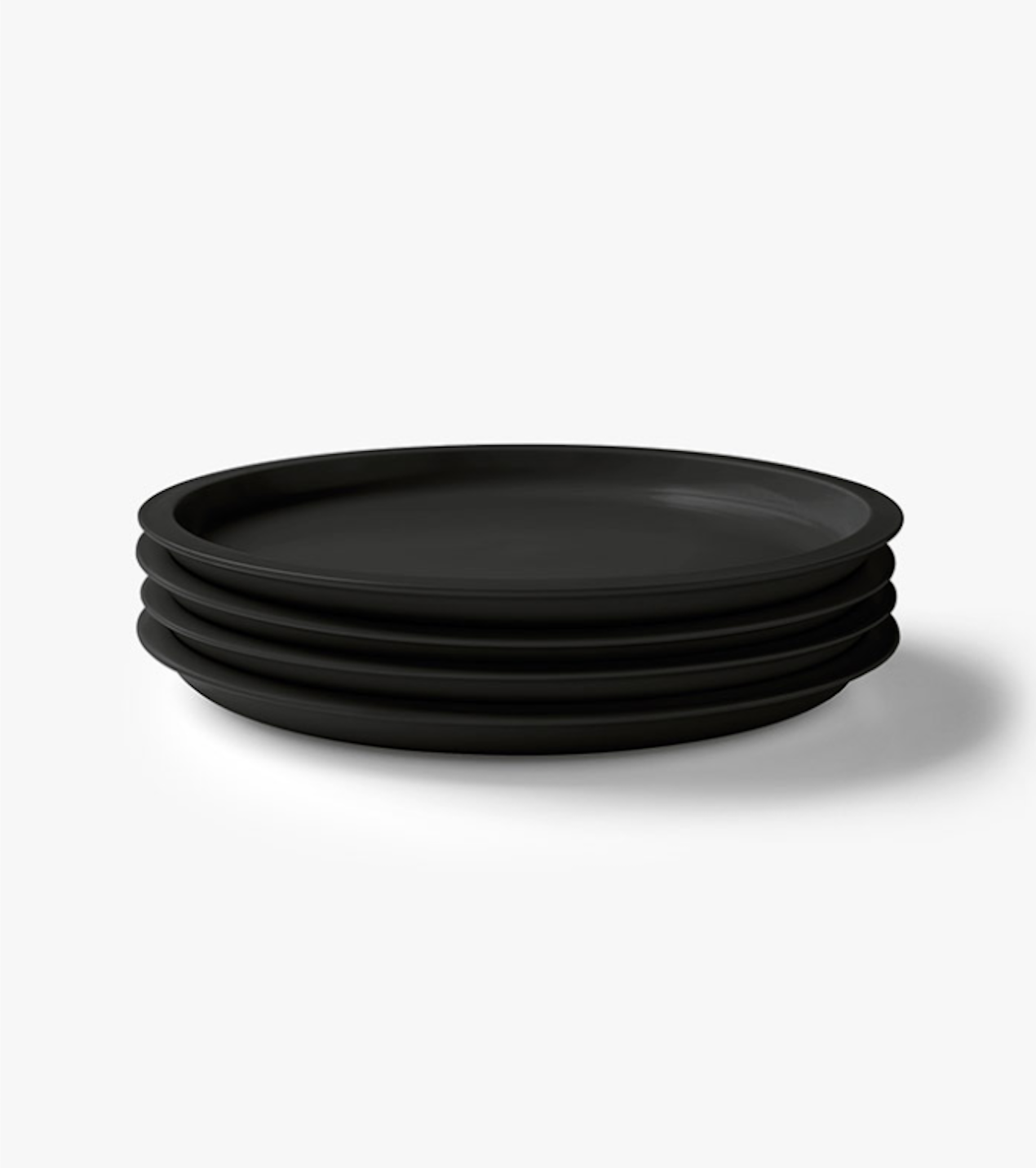 10 Easy Pieces Dramatic Black Dinnerware Remodelista Black Kali Dinner Plate From Aura Home