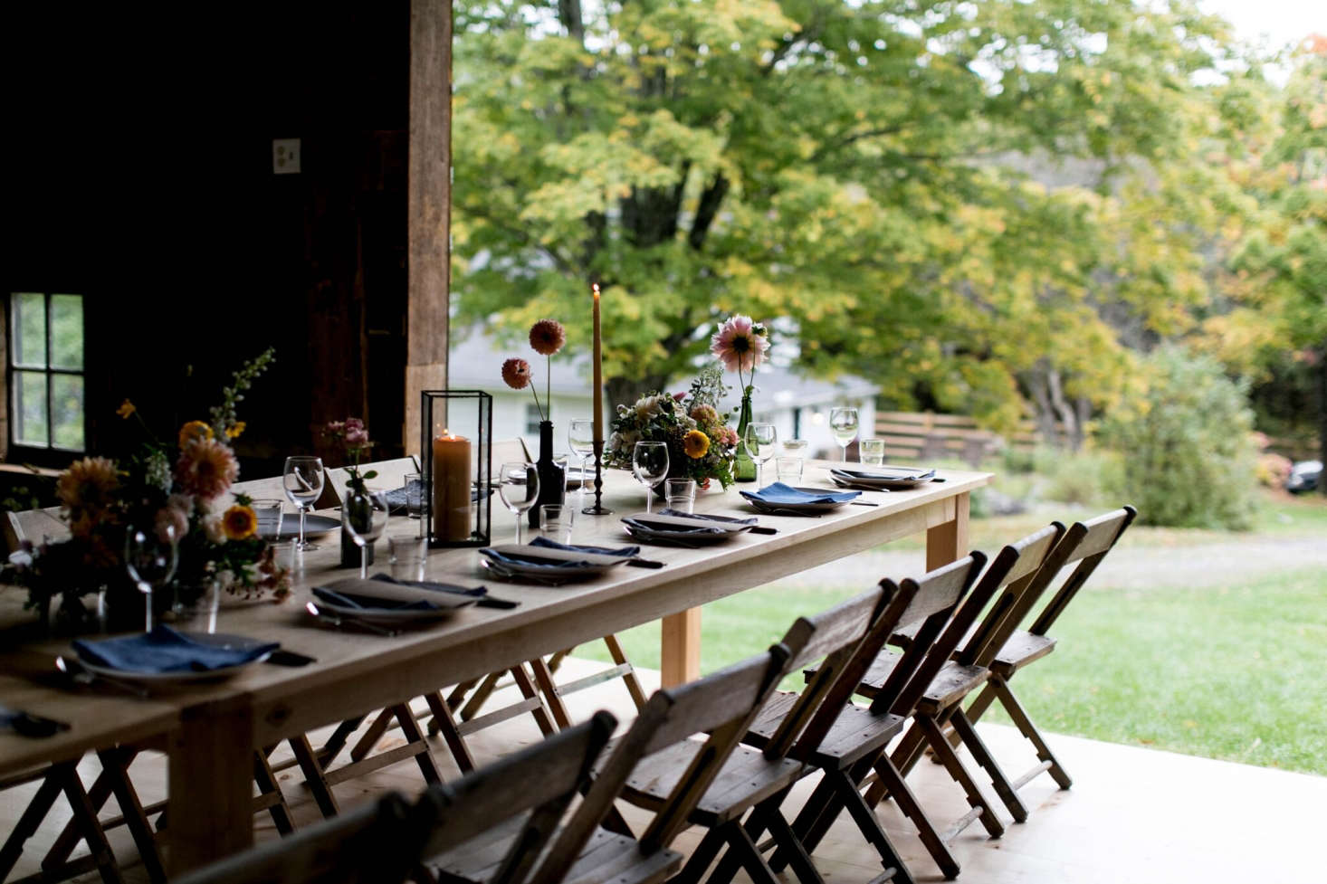 The Ravenwood dining table has four- and six-foot leaves and extends to 26 feet, “so that we can make use of it both with the barn doors open and shut.”