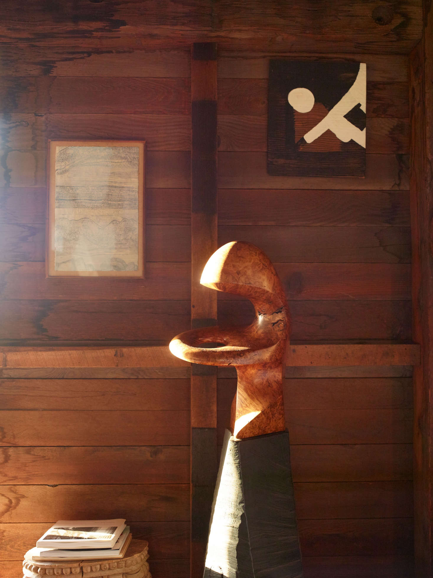 A wooden sculpture by the doorway.