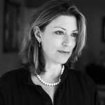 A profile photo of Julie Carlson