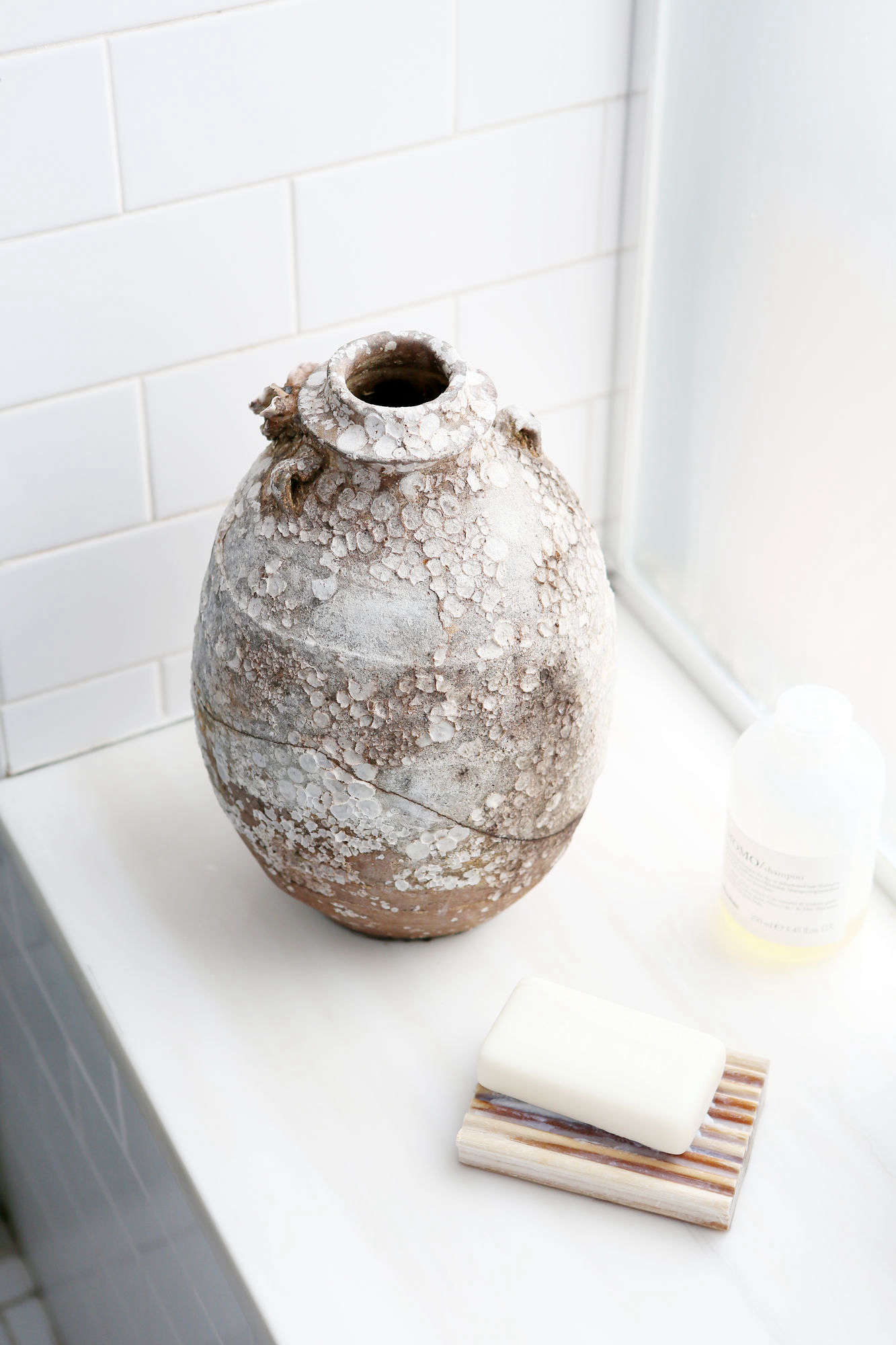 A spa-like vignette on a windowsill.
