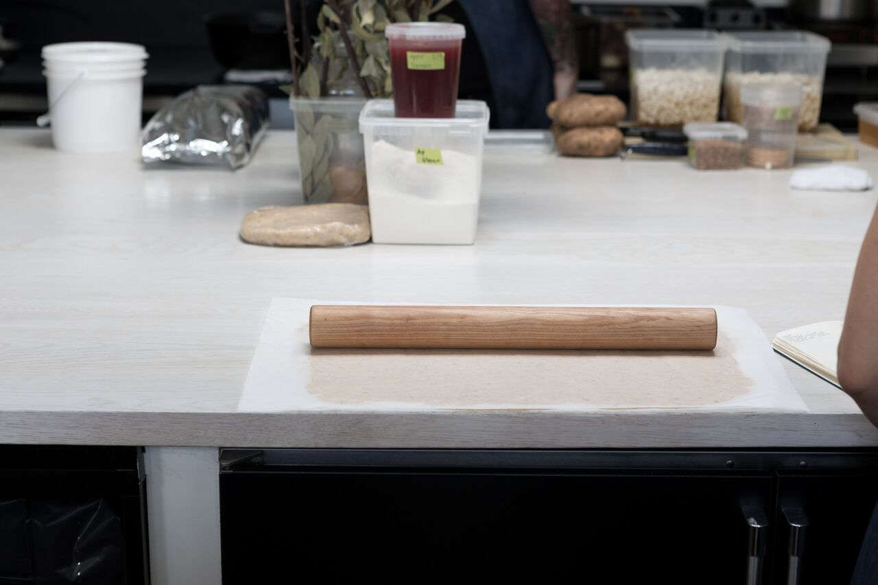 The center island countertops are bleached white oak.
