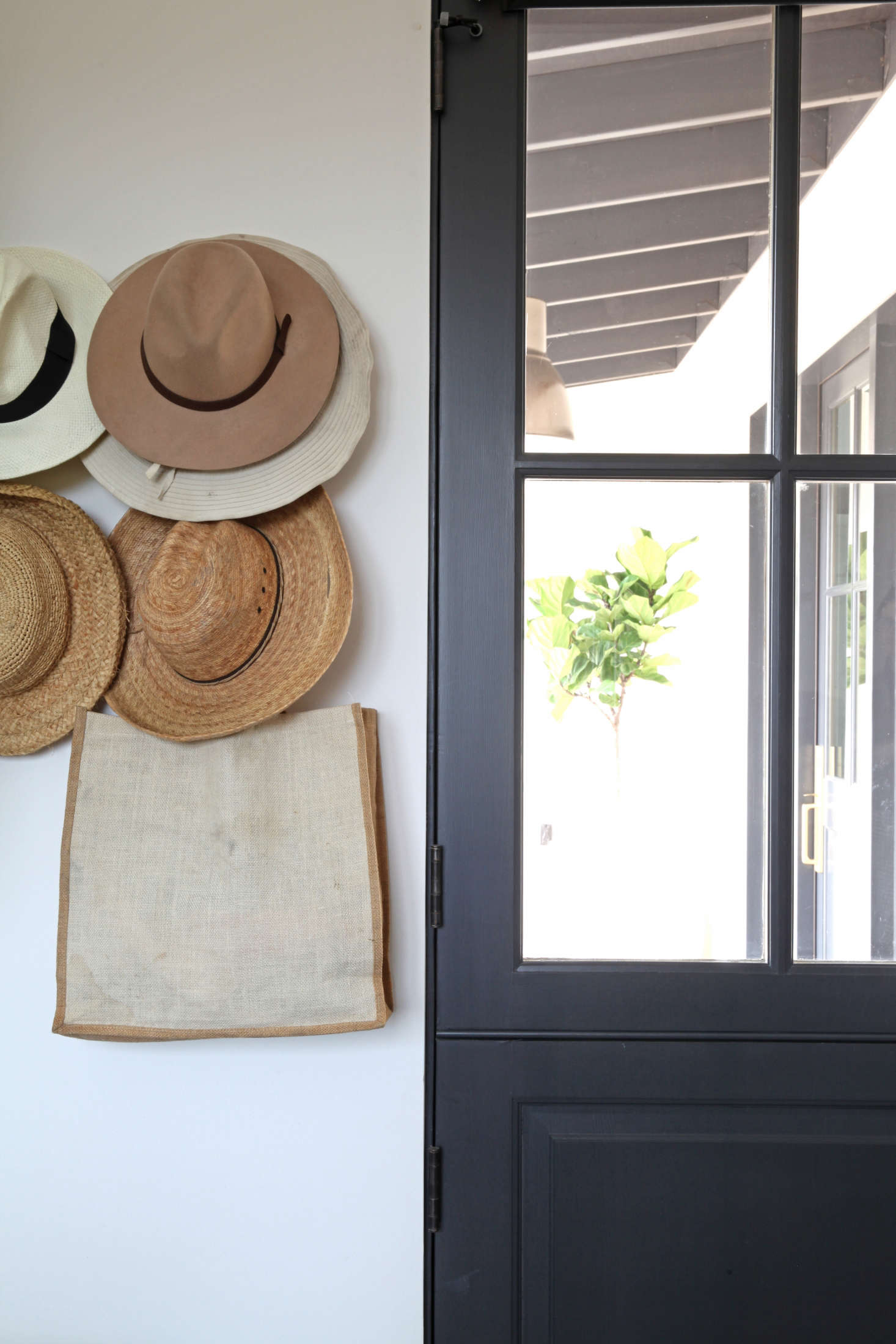 The mudroom/pantry is accessible by a Dutch door immediately to the right of the house