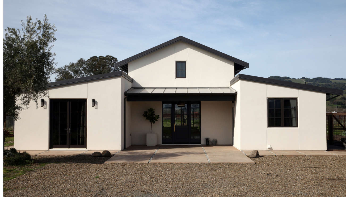 The exterior of the house is troweled stucco.