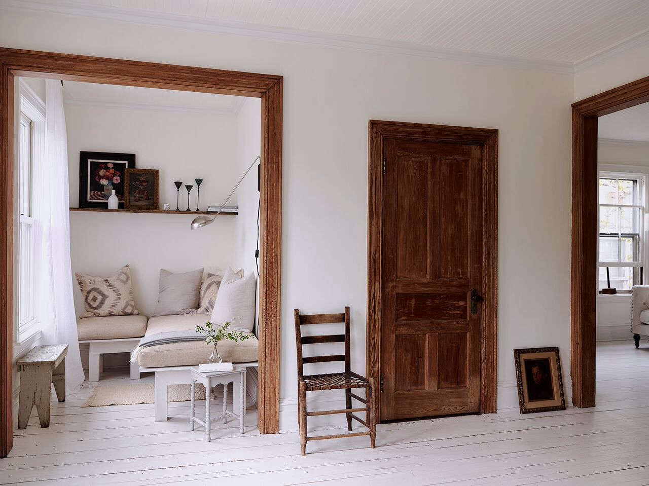 No need to hang art if you’re not ready (or if you have a cement or brick wall that makes it hard to hang things). It looks just as intentional when leaned thoughtfully against the wall or on a ledge. Photograph from House Call: 50 Shades of Weathered White in Hudson, NY, from Zio & Sons.