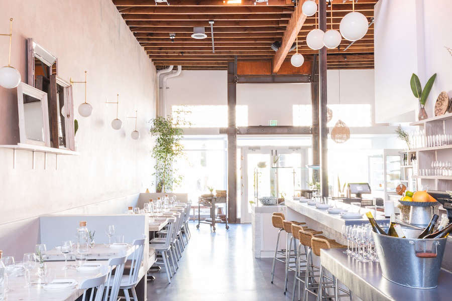 The concrete floor and counters are a nod to Weekends’ time in Paris: “We had a concrete floor in our kitchen,” Messerli says.
