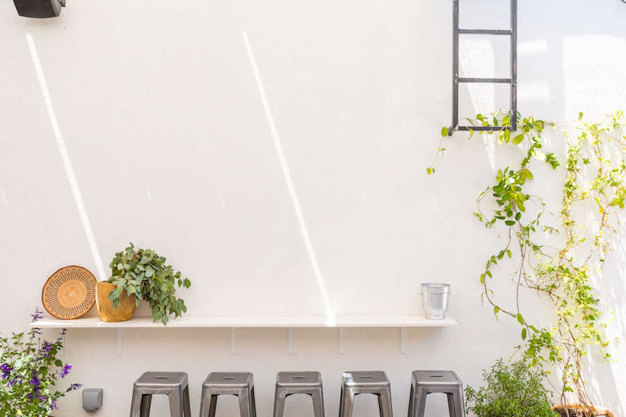 A long shelf doubles as impromptu seating.