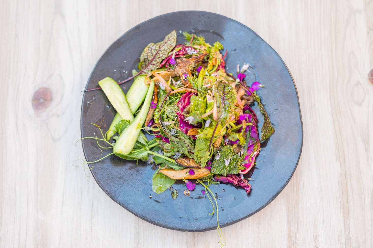 “We’re big into color and flavor; we’re not into rules,” Sperling and Fiffer say on their website. On the ever-changing menu are bowls and salads with garden-fresh ingredients like charred leeks, pea tendrils, and cilantro flowers. The duo selected the tableware themselves.