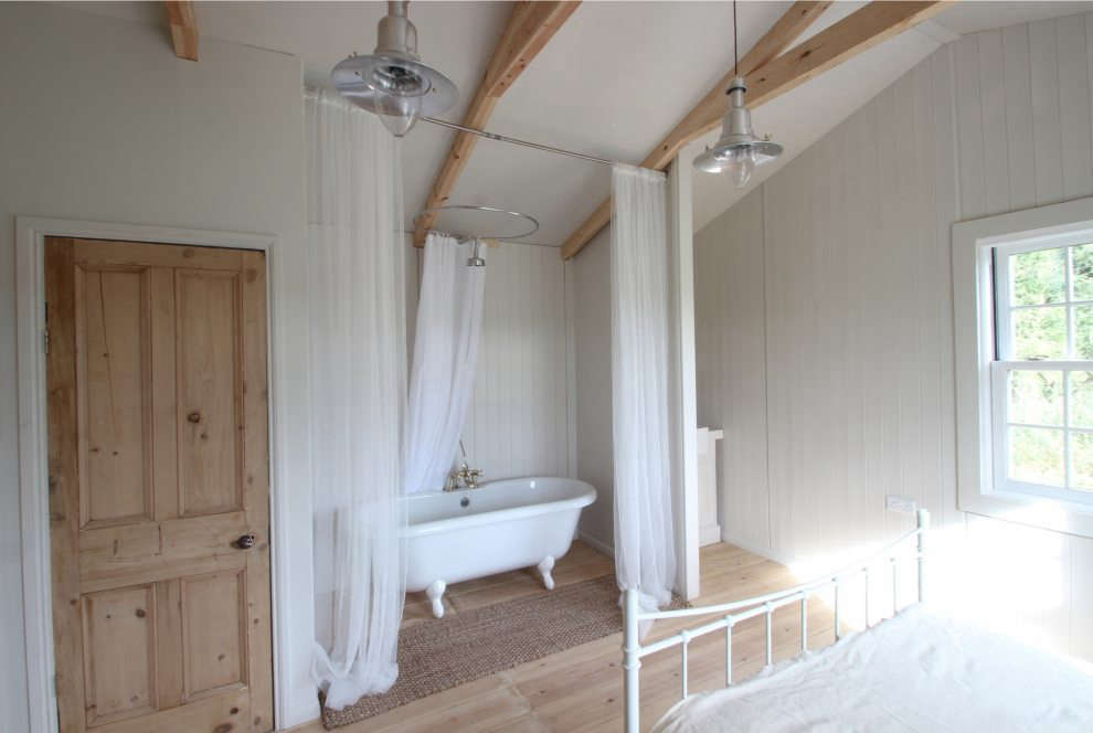 gauzy curtains surround a clawfoot tub for maximal luxuriating in a simple bespoke cabin in north - Floor To Ceiling Curtains gauzy curtains surround a clawfoot tub for maximal luxuriating in a simple bespoke cabin in north - Floor To Ceiling Curtains
