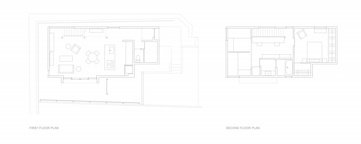 The ground floor is open plan; curtained dividers allow for flexible living on the second story, where the master bedroom and bath are the only spaces with doors.