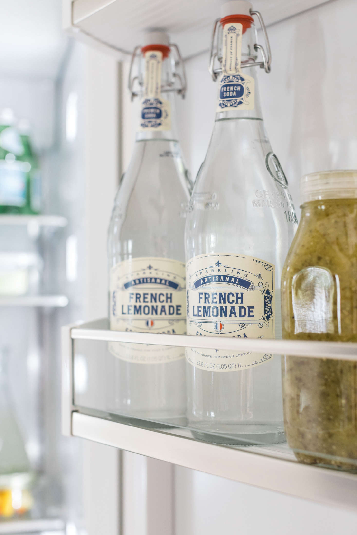 Items stored in the refrigerator door experience the greatest fluctuations in temperature. Reserve this area for foods and drinks with the longest shelf life, such as condiments, preserves, bottled water, soda, and juice.
