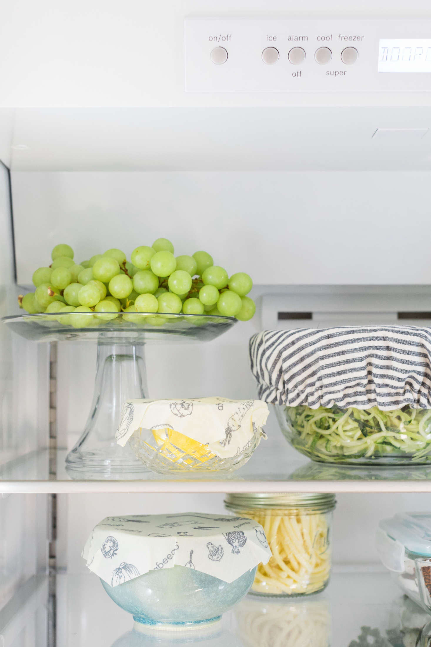 Tip: Fresh fruits and vegetables displayed attractively—like these grapes on a cake stand—are more likely to be eaten.