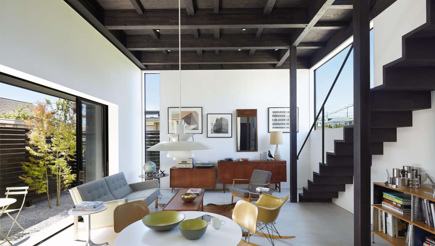 The living space is filled with natural light and cross ventilation, thanks to the north-facing windows (