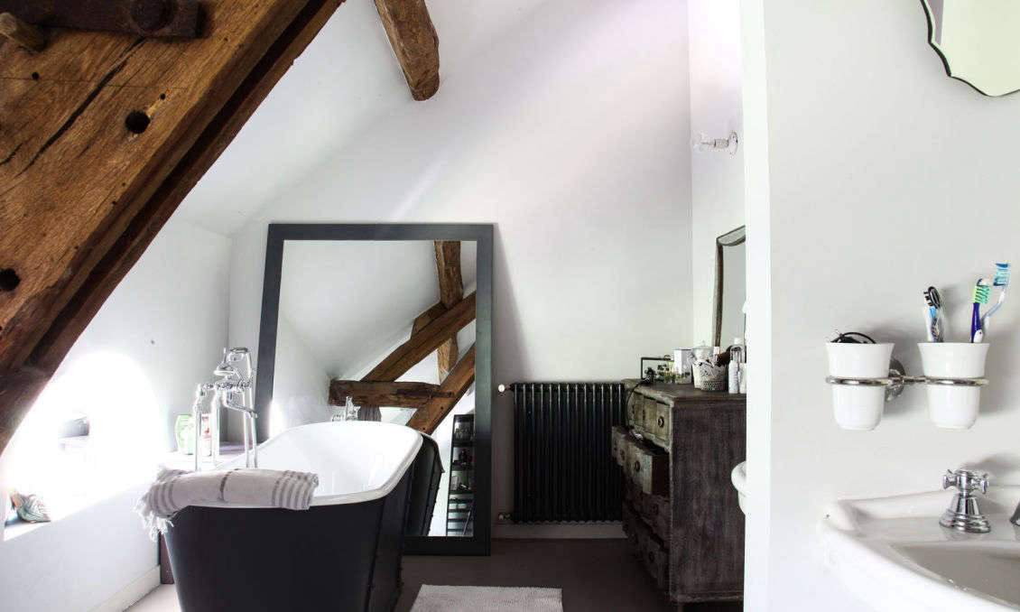 A bathroom in France by Clarisse Prudent, whose family is featured in a book on French living from the Socialite Family’s Constance Gennari. See more in The Socialite Family Book: Lifestyles of the Young and Chic, French Edition as well as The Bath en Noir: 10 Favorite Moody Black Bathrooms. Photograph by and courtesy of Constance Gennari.