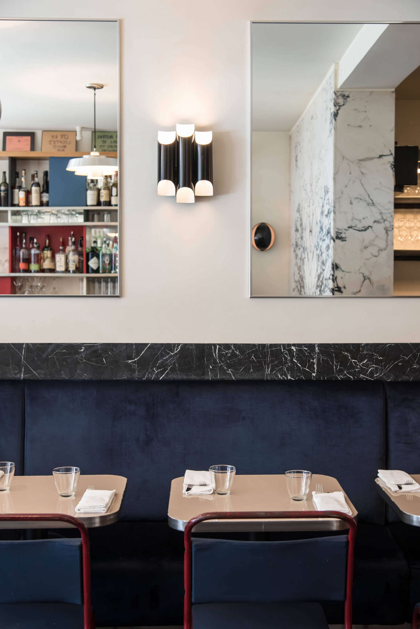 The idea that started it all: using marble as trim, as seen lining the banquettes at Mimi in New York City. Instead of maxing out the budget for the small bistro, the team used marble as an accent: “We found a lot of images from Vienna and France where marble was used instead of wood. This gave us the general concept of using marble as an outline, because we couldn’t afford to have the entire bar or floor be marble.” Read on in French Glam on a Budget: 15 Ideas to Steal from Mimi, New York’s Sexiest Bistro.