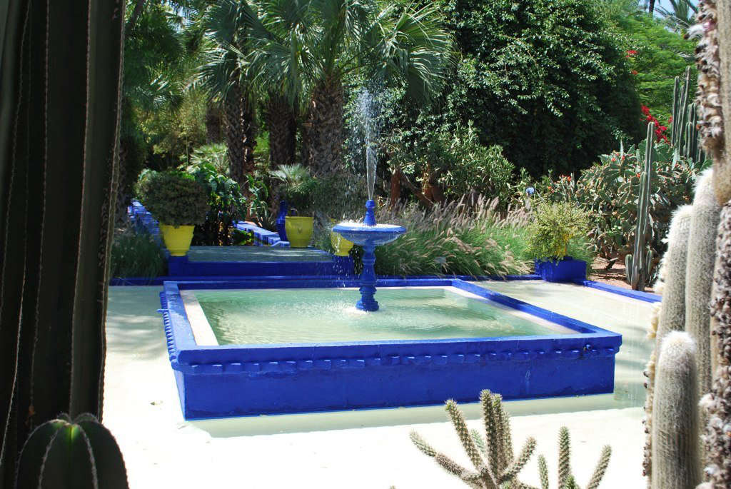 And one from Gardenista: At his Jardins Majorelle home and gardens in Morocco, Yves Saint Laurent painted fountains, pathways, even the house’s exterior in an homage to the original Yves. Photograph from 10 Garden Ideas to Steal From Morocco.