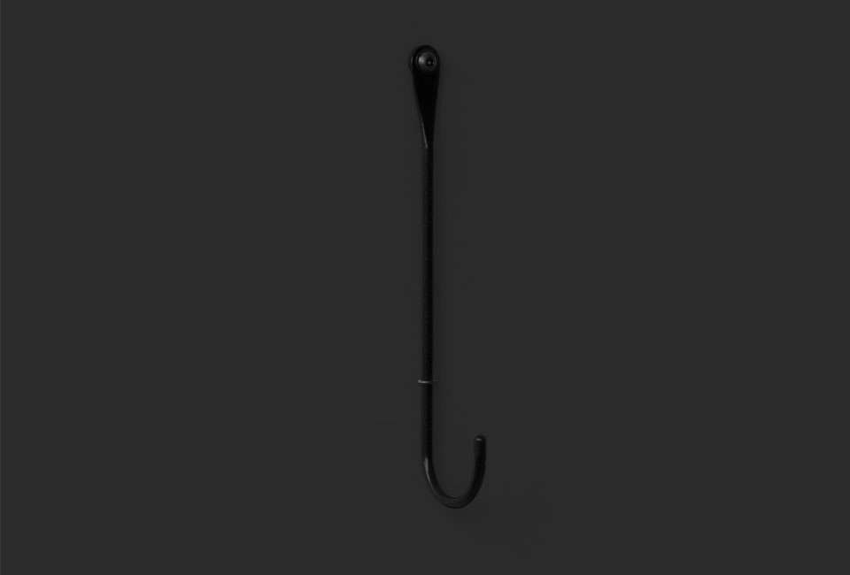 The black lacquered Bite Hook, like the other colors, can fade into the background when set against a tonal wall or stand out against white.