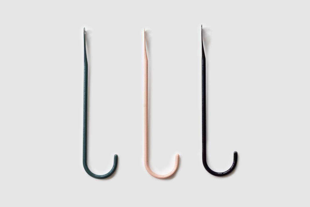 The Bite Hook—in Dark Green, Pink, and Black—is CHF 45 ($46 USD) each.