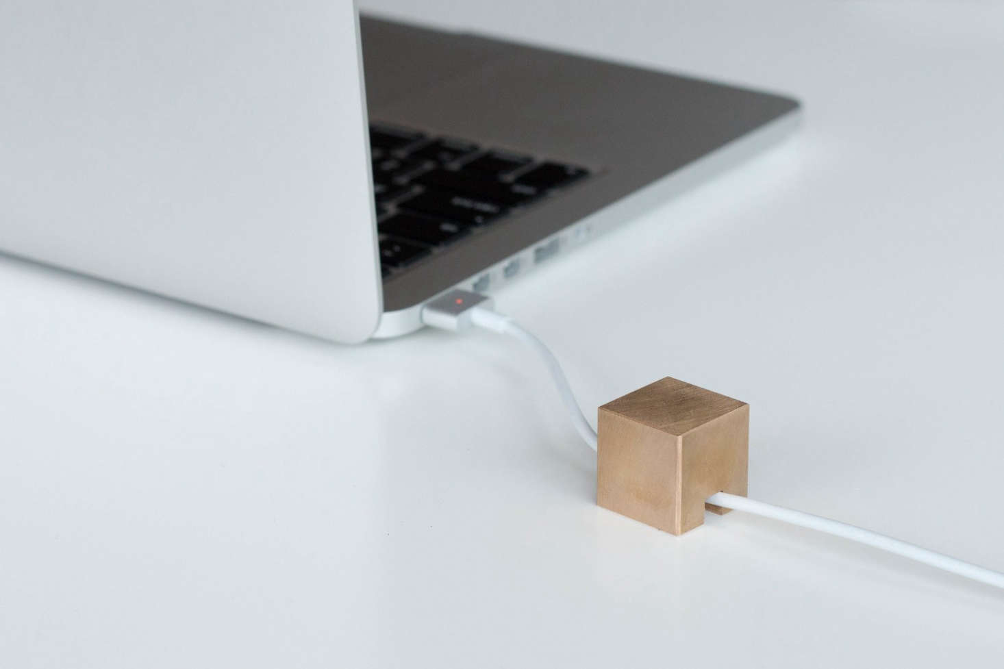 10 Quick And Easy Cord Control Solutions Remodelista Made By A Small San Francisco Design Firm Stacks Is 2 5cm Metal Cube