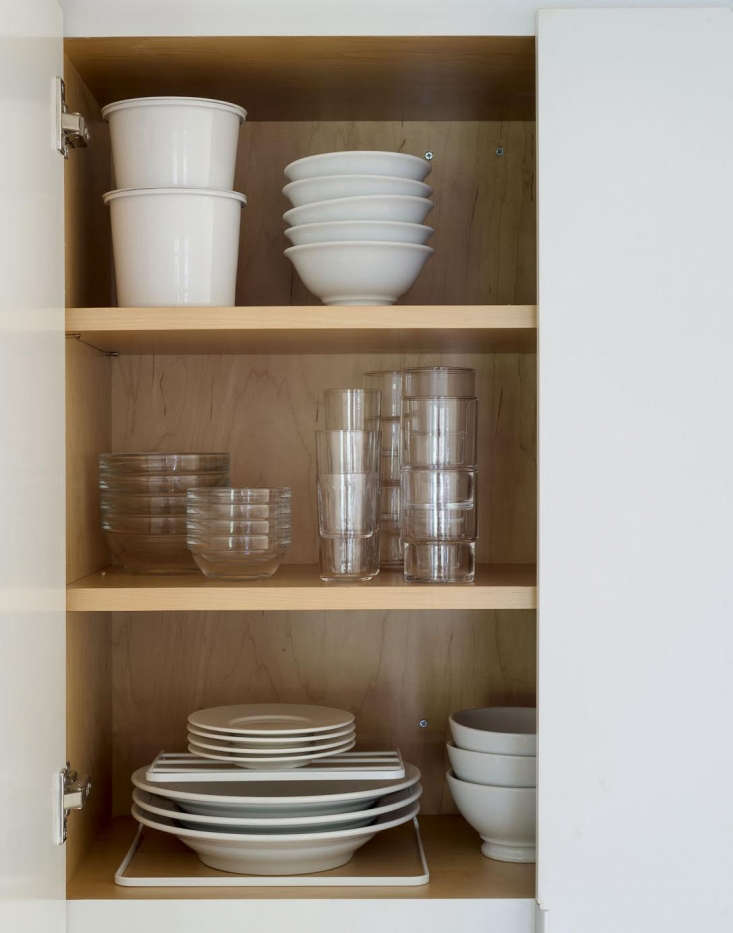 Dishes in Cabinet by Matthew Williams for Remodelista