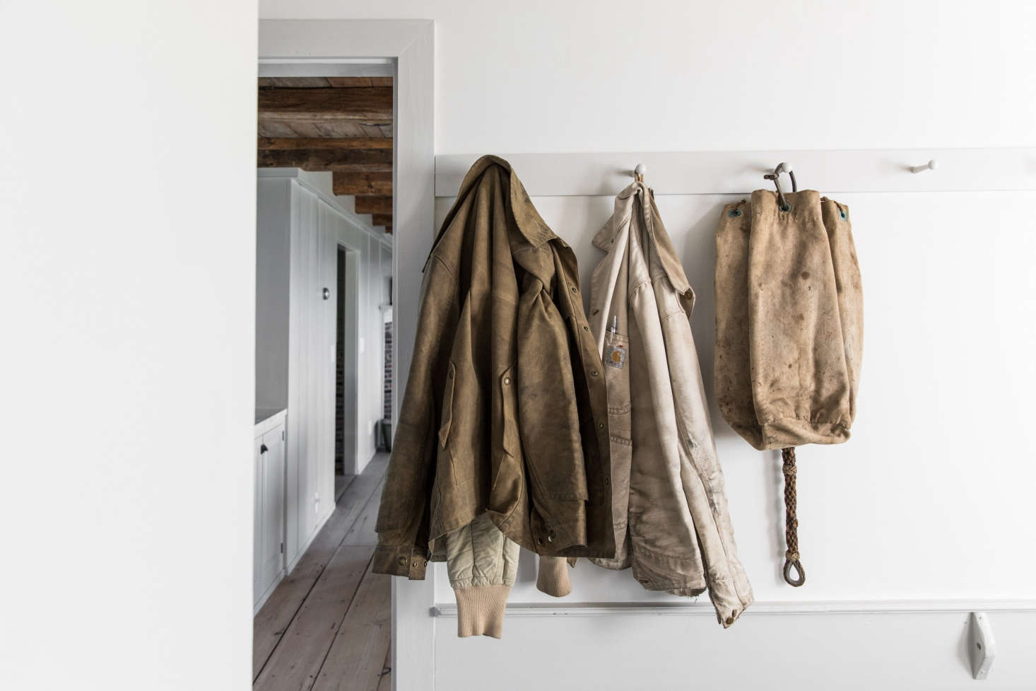 In the entryway, more peg rails.