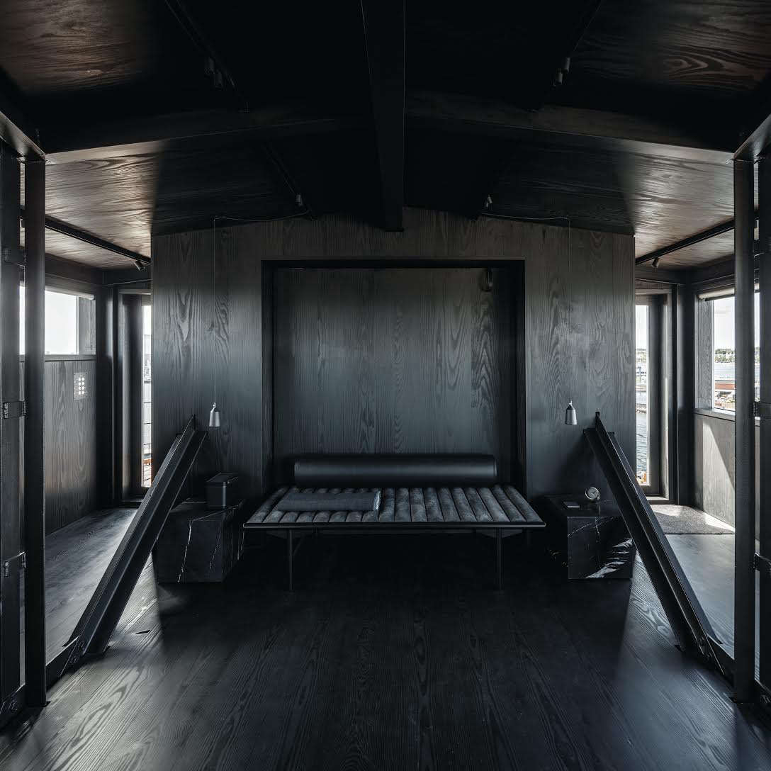 Alexa is admiring the Dinesen Douglas planks (finished with custom Megablack oil) in a converted coal crane in Copenhagen